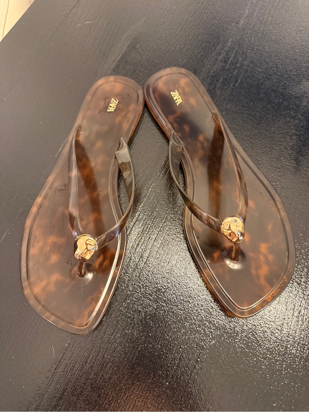 Zara Tortoiseshell Brown Jelly Flip Flop Sandals with Gold Emblem